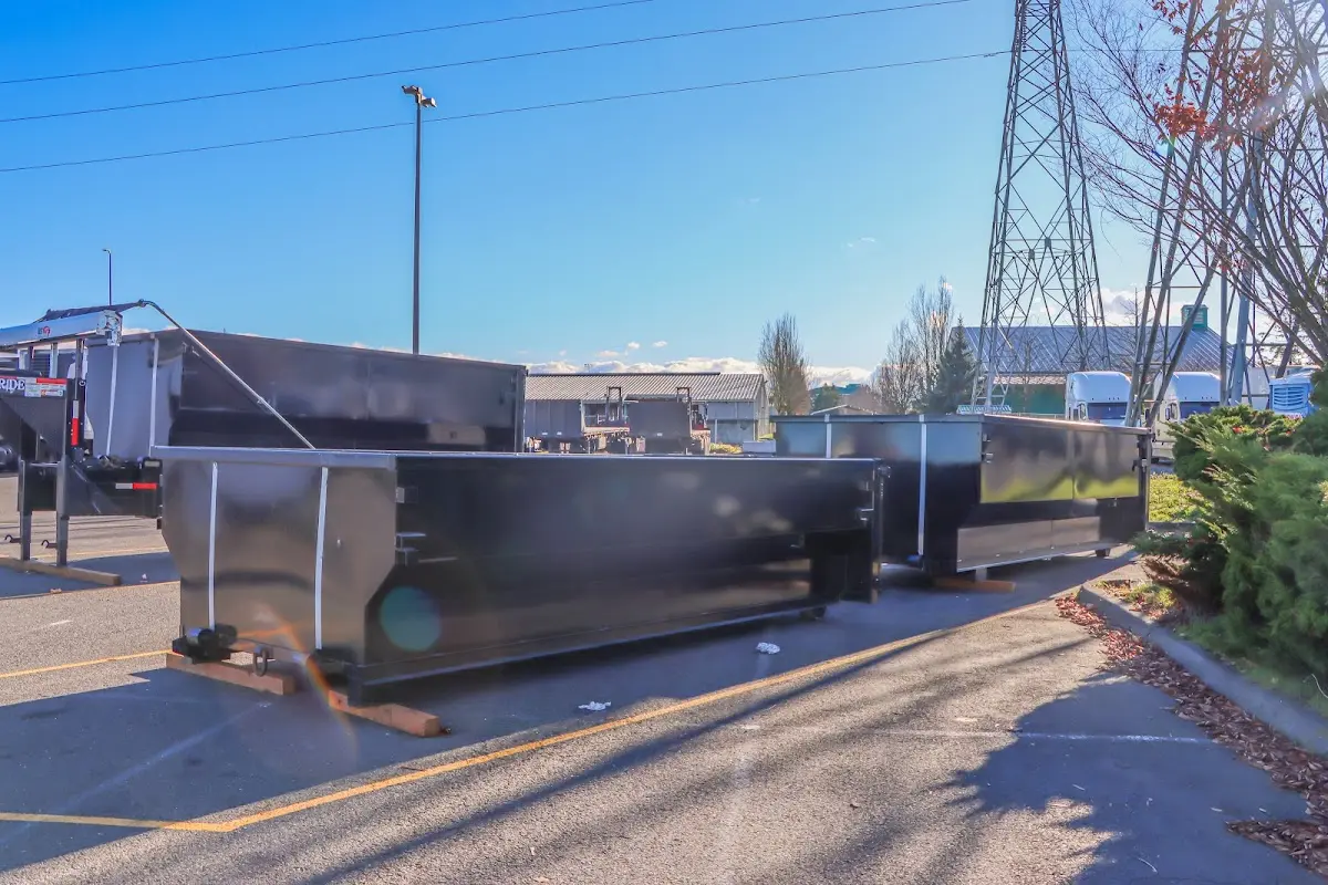 Roll-off dumpster ready for waste disposal at job site for Construction Dumpster Rental in Gresham Park
